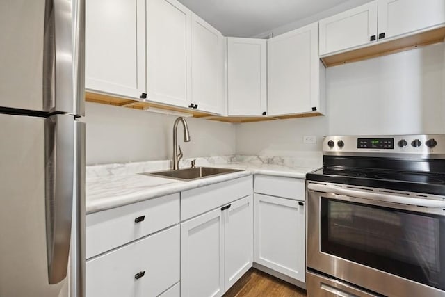 2650 N Lakeview Ave Unit 1603, Chicago, IL 60614 - kitchen featuring stainless steel appliances, light countertops, and white cabinetry