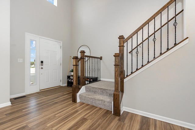 26550 W Old Stage Ln, Channahon, IL 60410 - entrance foyer featuring wood finished floors, stairs, and a towering ceiling
