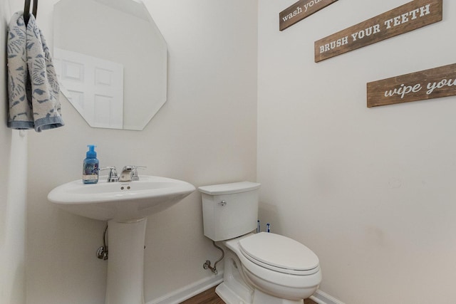 26550 W Old Stage Ln, Channahon, IL 60410 - bathroom featuring baseboards and wood finished floors