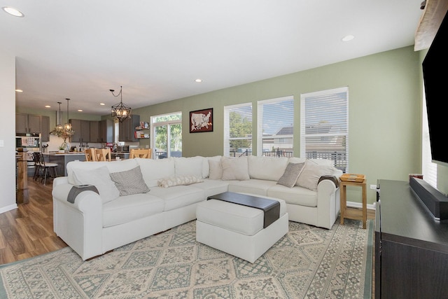 26550 W Old Stage Ln, Channahon, IL 60410 - living room featuring light wood-style flooring, a chandelier, and recessed lighting