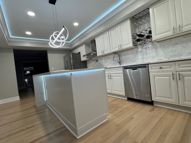 40 Portwine Rd, Willowbrook, IL 60527 - kitchen with appliances with stainless steel finishes, wall chimney range hood, light wood-style floors, backsplash, and recessed lighting