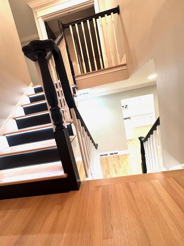40 Portwine Rd, Willowbrook, IL 60527 - stairway featuring baseboards and wood finished floors