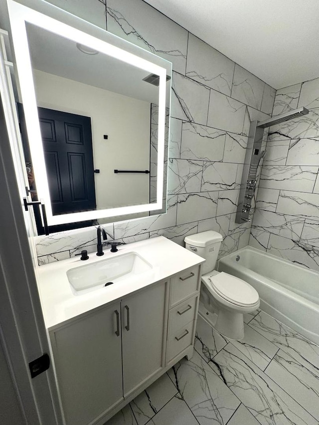 40 Portwine Rd, Willowbrook, IL 60527 - bathroom featuring tile walls, vanity, marble finish flooring, and bathtub / shower combination