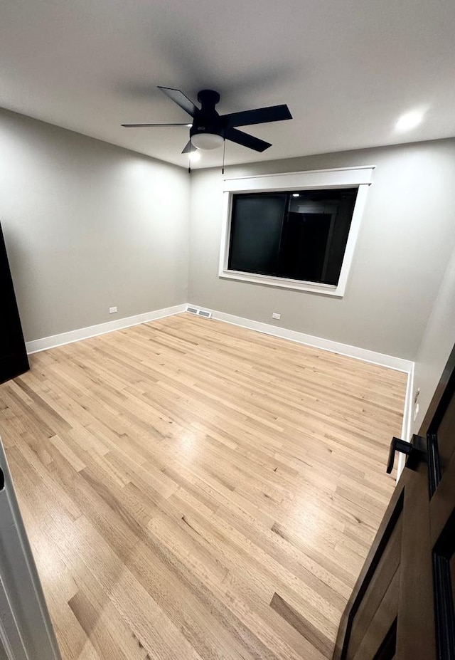 40 Portwine Rd, Willowbrook, IL 60527 - empty room with ceiling fan and wood finished floors