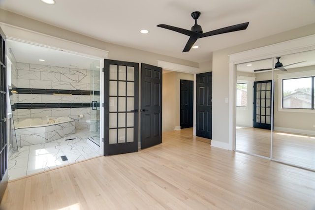 40 Portwine Rd, Willowbrook, IL 60527 - unfurnished bedroom featuring a closet, recessed lighting, connected bathroom, light wood-style floors, and ceiling fan