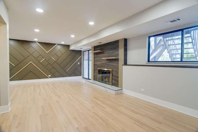40 Portwine Rd, Willowbrook, IL 60527 - unfurnished living room featuring wood finished floors, a fireplace, and recessed lighting