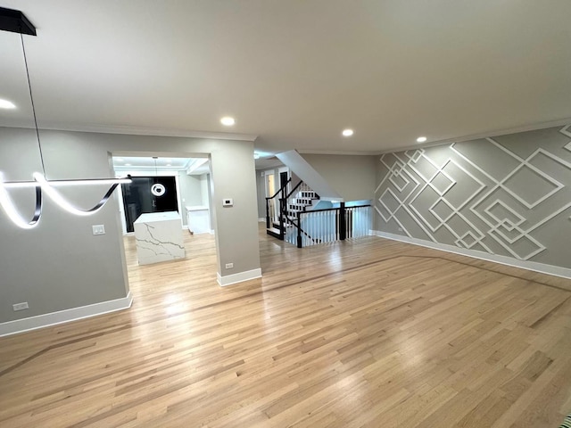 40 Portwine Rd, Willowbrook, IL 60527 - unfurnished living room featuring recessed lighting, ornamental molding, light wood-style floors, and stairs