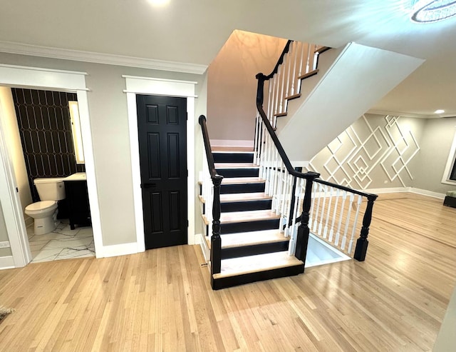 40 Portwine Rd, Willowbrook, IL 60527 - staircase with crown molding and wood finished floors