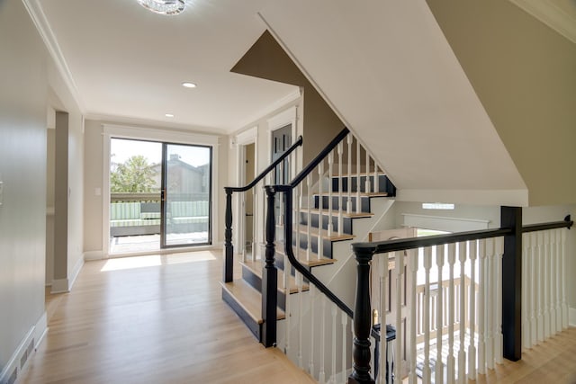 40 Portwine Rd, Willowbrook, IL 60527 - stairway with wood finished floors and ornamental molding