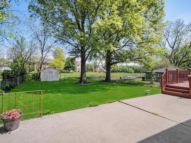 18 E 155th Pl, South Holland, IL 60473 - view of patio / terrace with a deck and a storage shed