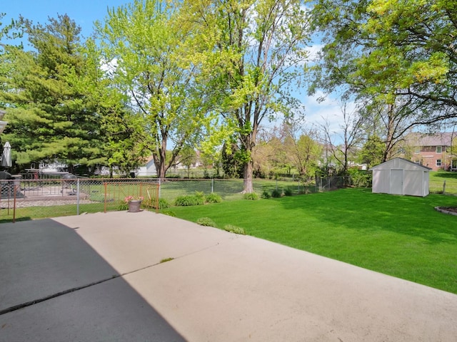 18 E 155th Pl, South Holland, IL 60473 - view of yard with a patio area and a storage unit