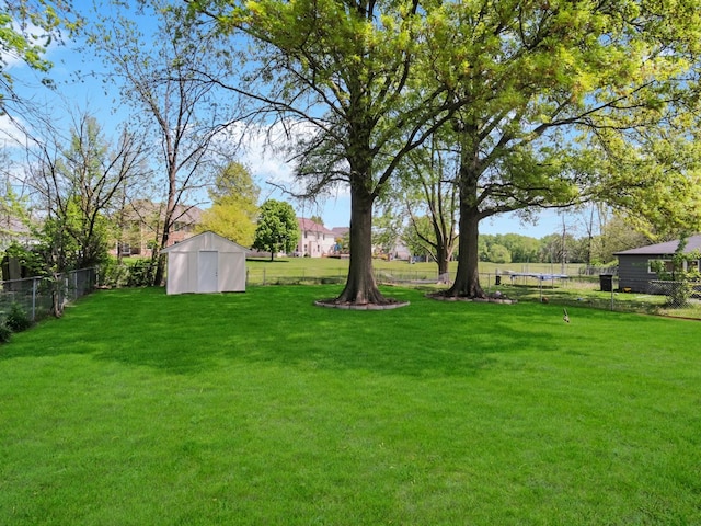 18 E 155th Pl, South Holland, IL 60473 - view of yard with a storage shed