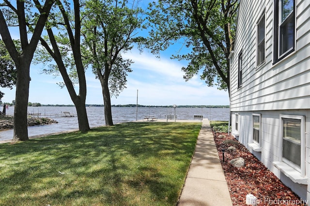 36 S Pistakee Lake Rd, Fox Lake, IL 60020 - view of green lawn with a water view