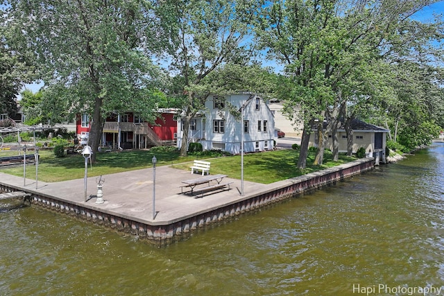 36 S Pistakee Lake Rd, Fox Lake, IL 60020 - dock area featuring a water view and a lawn