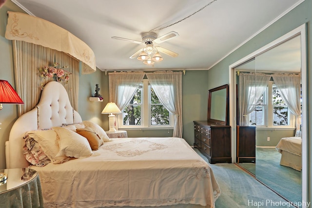 36 S Pistakee Lake Rd, Fox Lake, IL 60020 - carpeted bedroom with a closet, ornamental molding, and a ceiling fan