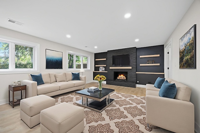 13741 S 85th Ave, Orland Park, IL 60462 - living room featuring light wood finished floors, recessed lighting, and a brick fireplace