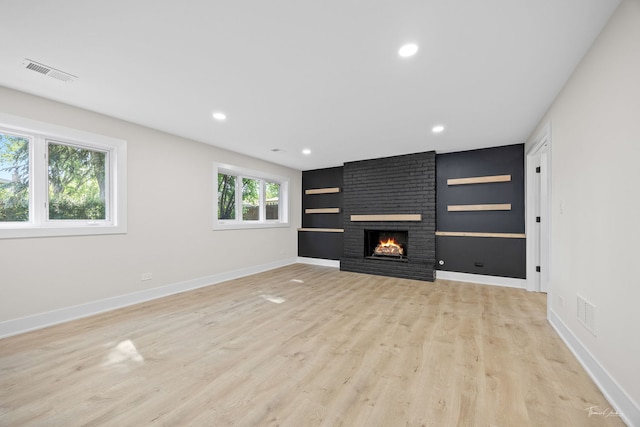 13741 S 85th Ave, Orland Park, IL 60462 - unfurnished living room with a brick fireplace, light wood-style floors, and recessed lighting