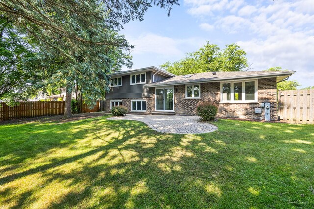 13741 S 85th Ave, Orland Park, IL 60462 - rear view of house with brick siding and a patio area