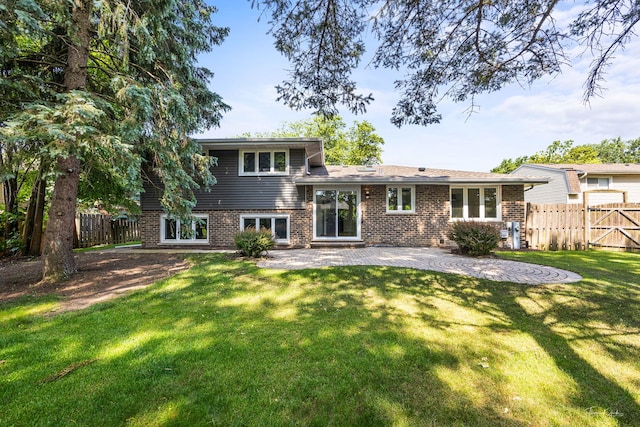 13741 S 85th Ave, Orland Park, IL 60462 - back of house with a patio and brick siding