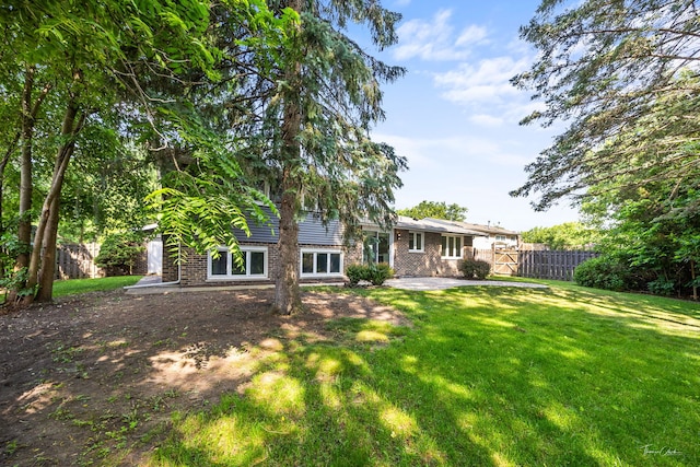 13741 S 85th Ave, Orland Park, IL 60462 - back of house with a patio area and brick siding