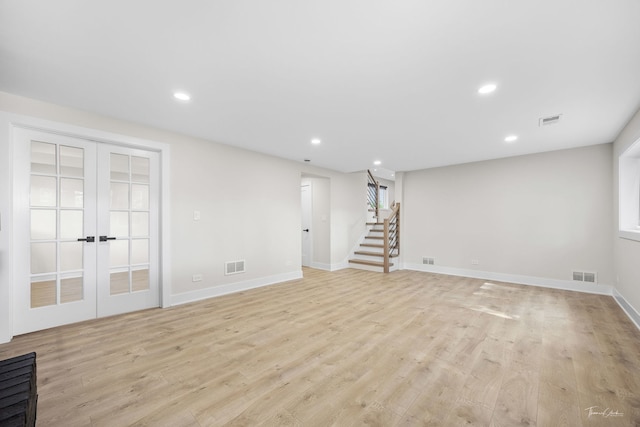 13741 S 85th Ave, Orland Park, IL 60462 - below grade area with stairway, recessed lighting, light wood finished floors, and french doors