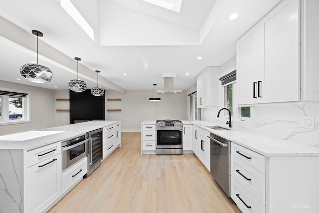 13741 S 85th Ave, Orland Park, IL 60462 - kitchen with appliances with stainless steel finishes, wine cooler, light wood finished floors, white cabinetry, and recessed lighting