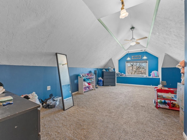 2529 Scoville Ave, Berwyn, IL 60402 - rec room with lofted ceiling, carpet, a ceiling fan, and a textured ceiling