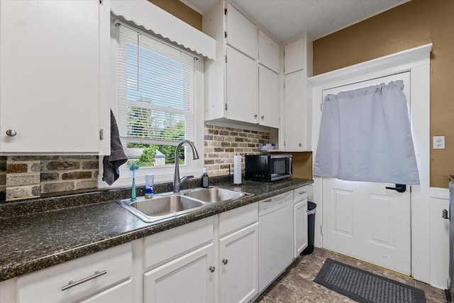 543 E Orleans St, Paxton, IL 60957 - kitchen featuring white dishwasher, white cabinetry, and dark countertops