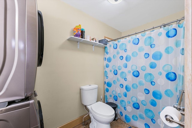 543 E Orleans St, Paxton, IL 60957 - full bath with stacked washing machine and dryer, a shower with shower curtain, and tile patterned floors