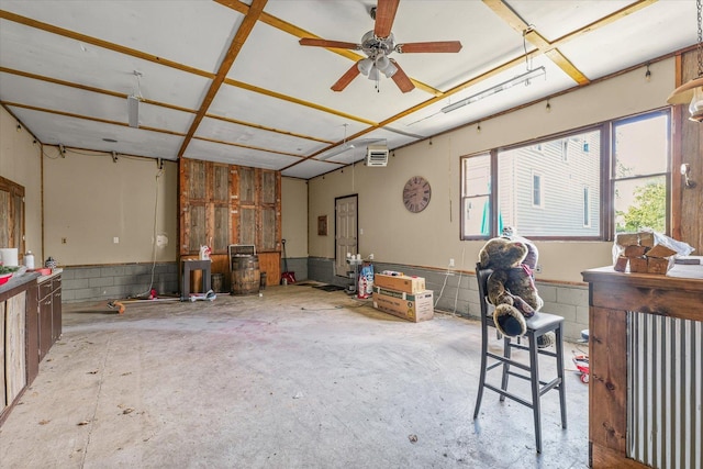 543 E Orleans St, Paxton, IL 60957 - misc room with concrete flooring and ceiling fan
