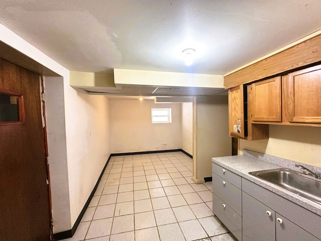 5608 S Spaulding Ave, Chicago, IL 60629 - kitchen with light countertops, light tile patterned floors, and gray cabinetry