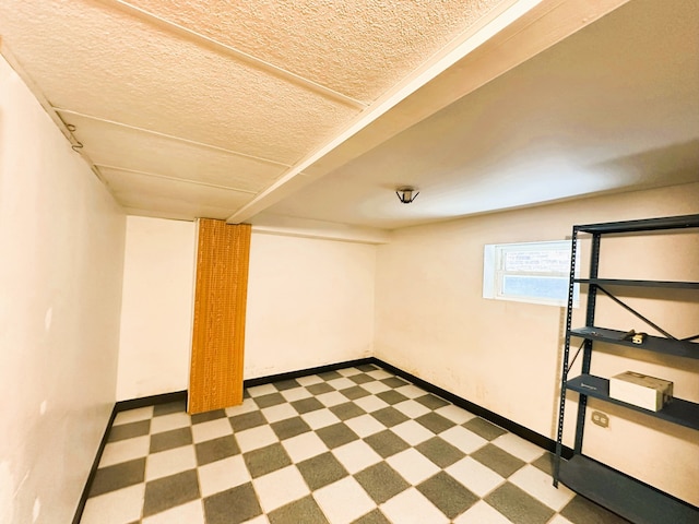 5608 S Spaulding Ave, Chicago, IL 60629 - basement with tile patterned floors and a textured ceiling