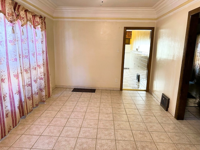 5608 S Spaulding Ave, Chicago, IL 60629 - unfurnished room featuring ornamental molding and light tile patterned flooring