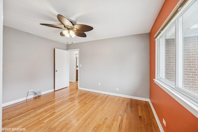 1627 Downing Ave, Westchester, IL 60154 - unfurnished room with a ceiling fan and light wood-style flooring