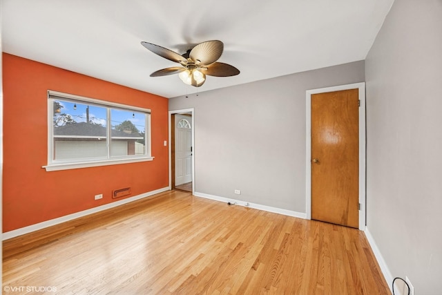 1627 Downing Ave, Westchester, IL 60154 - unfurnished room with a ceiling fan and wood finished floors