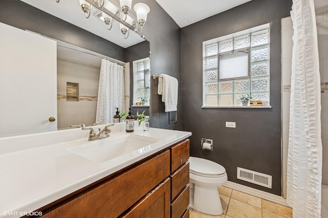 1627 Downing Ave, Westchester, IL 60154 - full bathroom featuring vanity, tile patterned flooring, and a shower with shower curtain