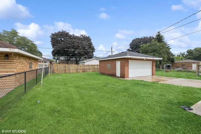 1627 Downing Ave, Westchester, IL 60154 - view of yard featuring a garage and an outdoor structure