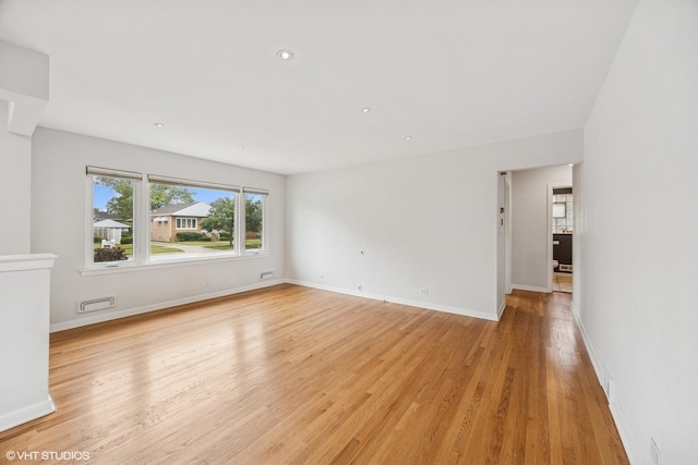 1627 Downing Ave, Westchester, IL 60154 - unfurnished room featuring light wood-style floors and recessed lighting