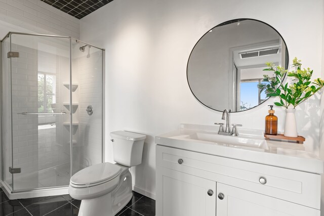 3200 N Lake Shore Dr Unit 302, Chicago, IL 60657 - bathroom featuring vanity, a shower stall, and plenty of natural light
