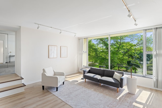 3200 N Lake Shore Dr Unit 302, Chicago, IL 60657 - living room featuring track lighting and light wood-style floors
