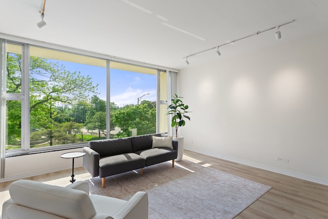 3200 N Lake Shore Dr Unit 302, Chicago, IL 60657 - living area featuring track lighting, light wood-type flooring, and expansive windows