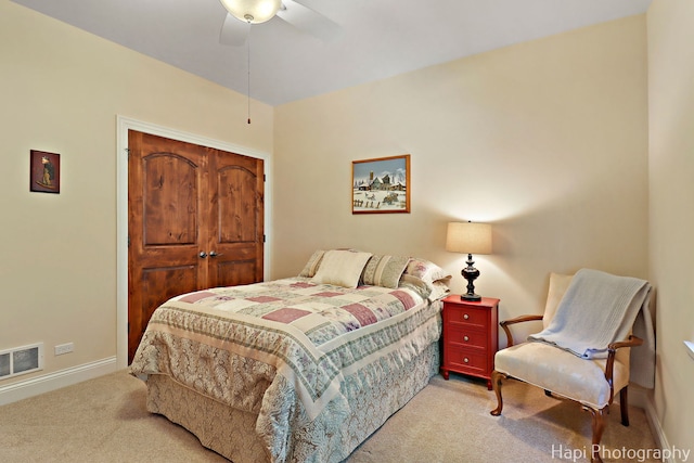 9516 Thousand Oaks Dr, Spring Grove, IL 60081 - bedroom featuring light colored carpet, a closet, and a ceiling fan