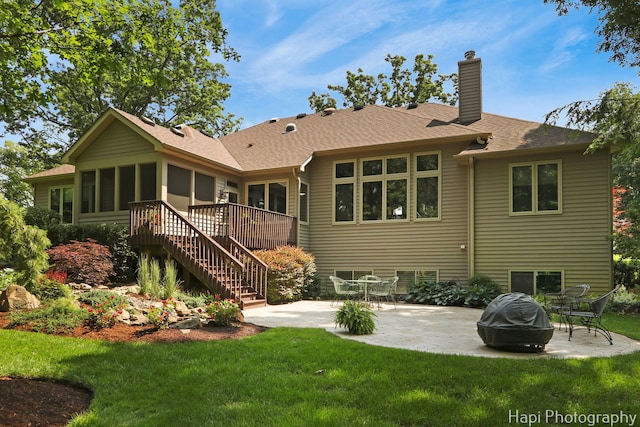 9516 Thousand Oaks Dr, Spring Grove, IL 60081 - rear view of property featuring a patio area, a sunroom, stairs, a chimney, and a lawn