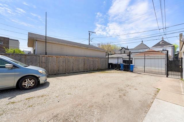 1630 N Avers Ave, Chicago, IL 60647 - exterior space featuring an outbuilding and a gate