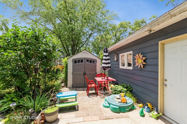 1429 N May St, Joliet, IL 60435 - view of patio / terrace with a storage unit