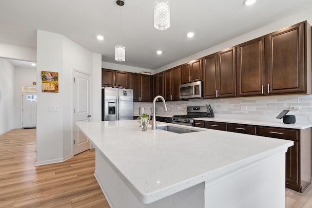 153 N Bend Way, Elgin, IL 60124 - kitchen featuring appliances with stainless steel finishes, backsplash, light wood-style floors, recessed lighting, and dark brown cabinetry