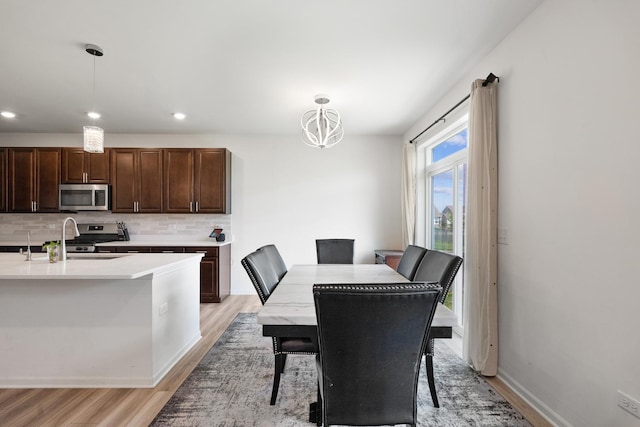 153 N Bend Way, Elgin, IL 60124 - dining space featuring light wood-style floors and recessed lighting
