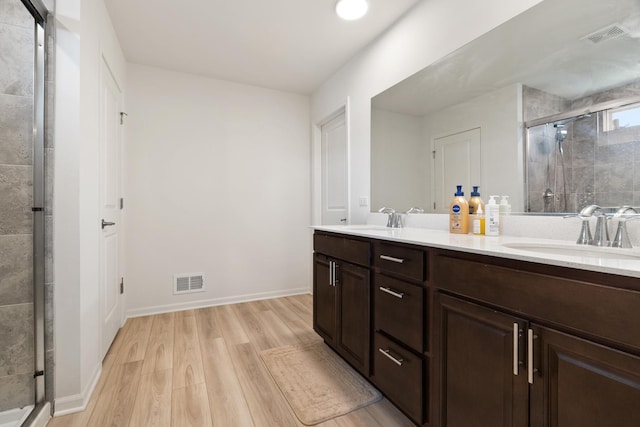 153 N Bend Way, Elgin, IL 60124 - full bath featuring double vanity, wood finished floors, and a stall shower