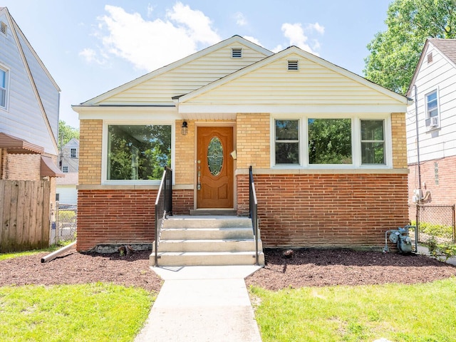 2408 Nathaniel Pl, Evanston, IL 60202 - bungalow-style house featuring brick siding