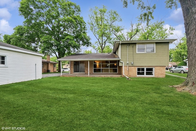 217 Heather Ln, Wilmette, IL 60091 - back of property with a lawn and brick siding